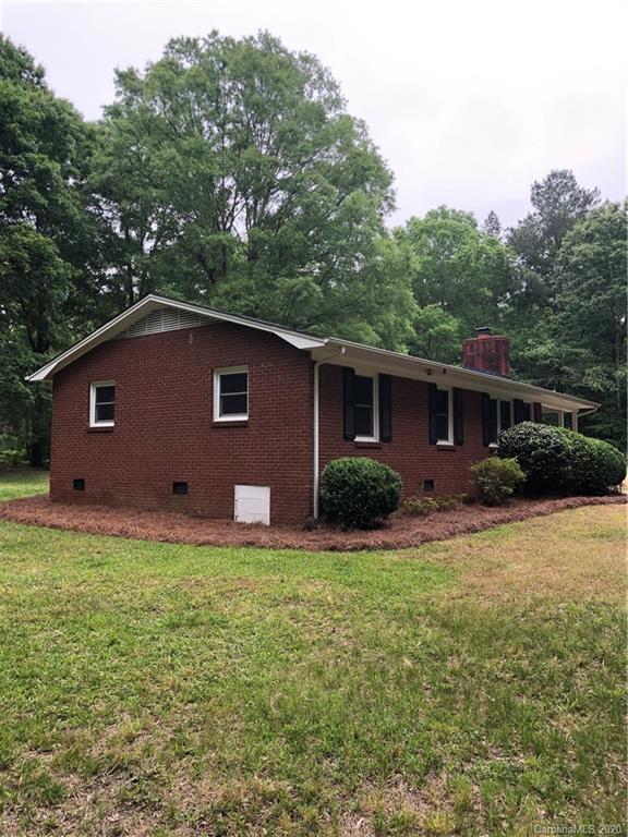 2117 White Store Road, Unit 126 Monroe, NC 28112 - Photo 5 of 20 a view of a house with backyard and garden