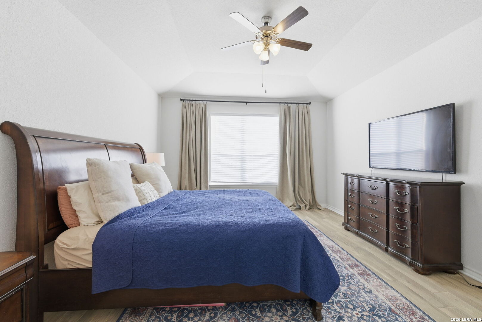 3410 Copper Acres Bulverde, TX 78163 - Photo 22 of 50 a bedroom with a large bed and a window
