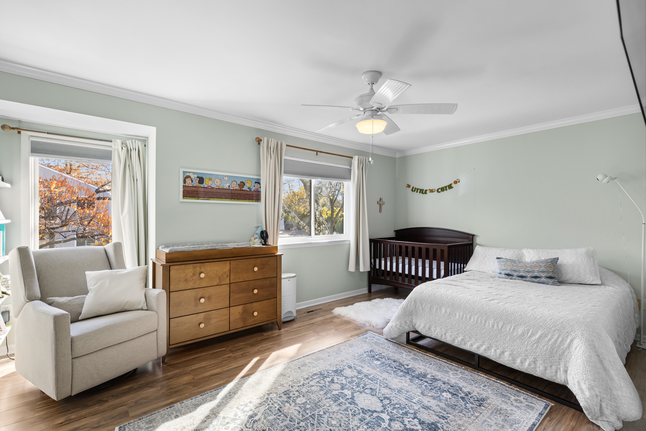 48 Randall Avenue, Unit 3 Stamford, CT 06905 - Photo 13 of 25 a bedroom with a bed and wooden floor