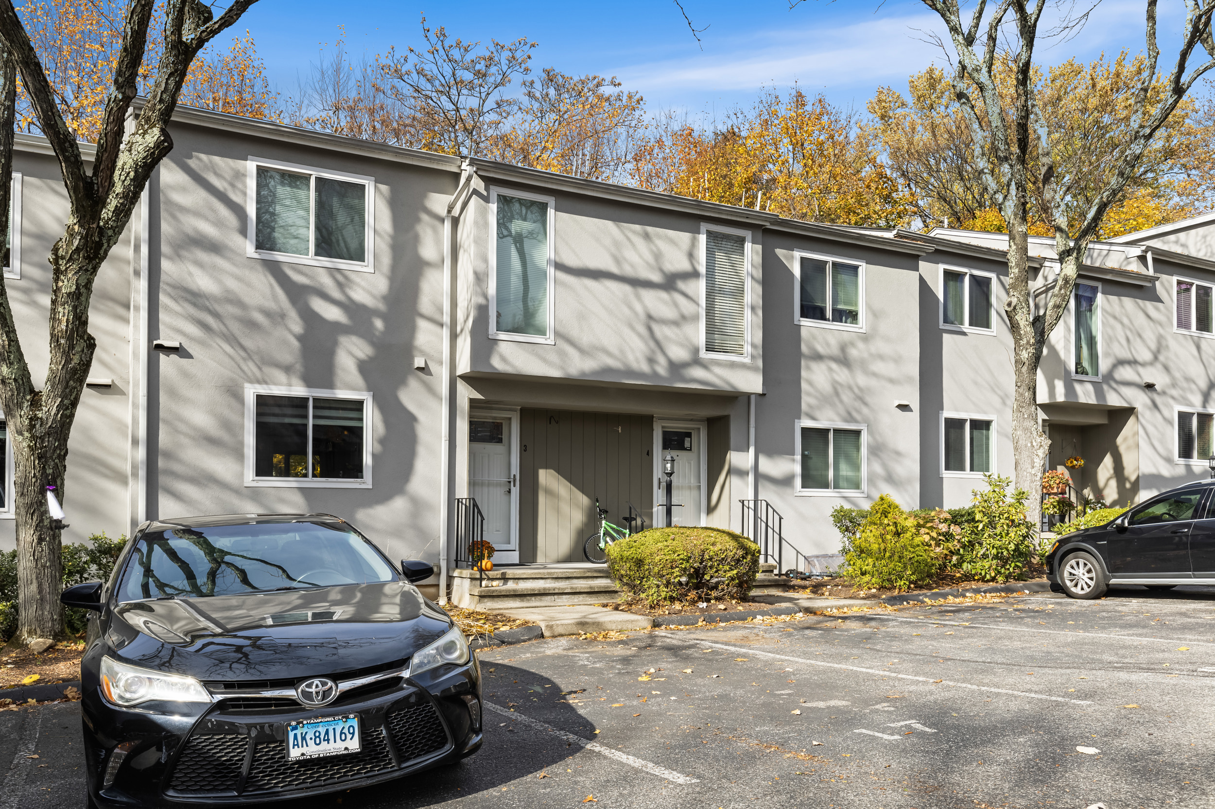 48 Randall Avenue, Unit 3 Stamford, CT 06905 - Photo 22 of 25 a view of a car parked in front of a house