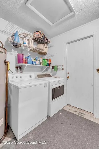 a front view of house with yard and outdoor seating