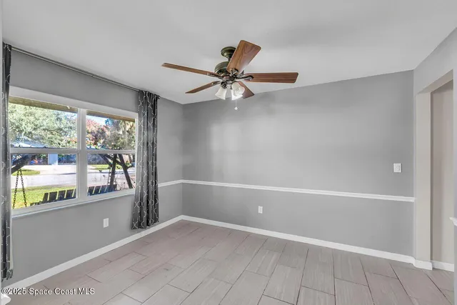 a kitchen with stainless steel appliances granite countertop a refrigerator a sink and a stove