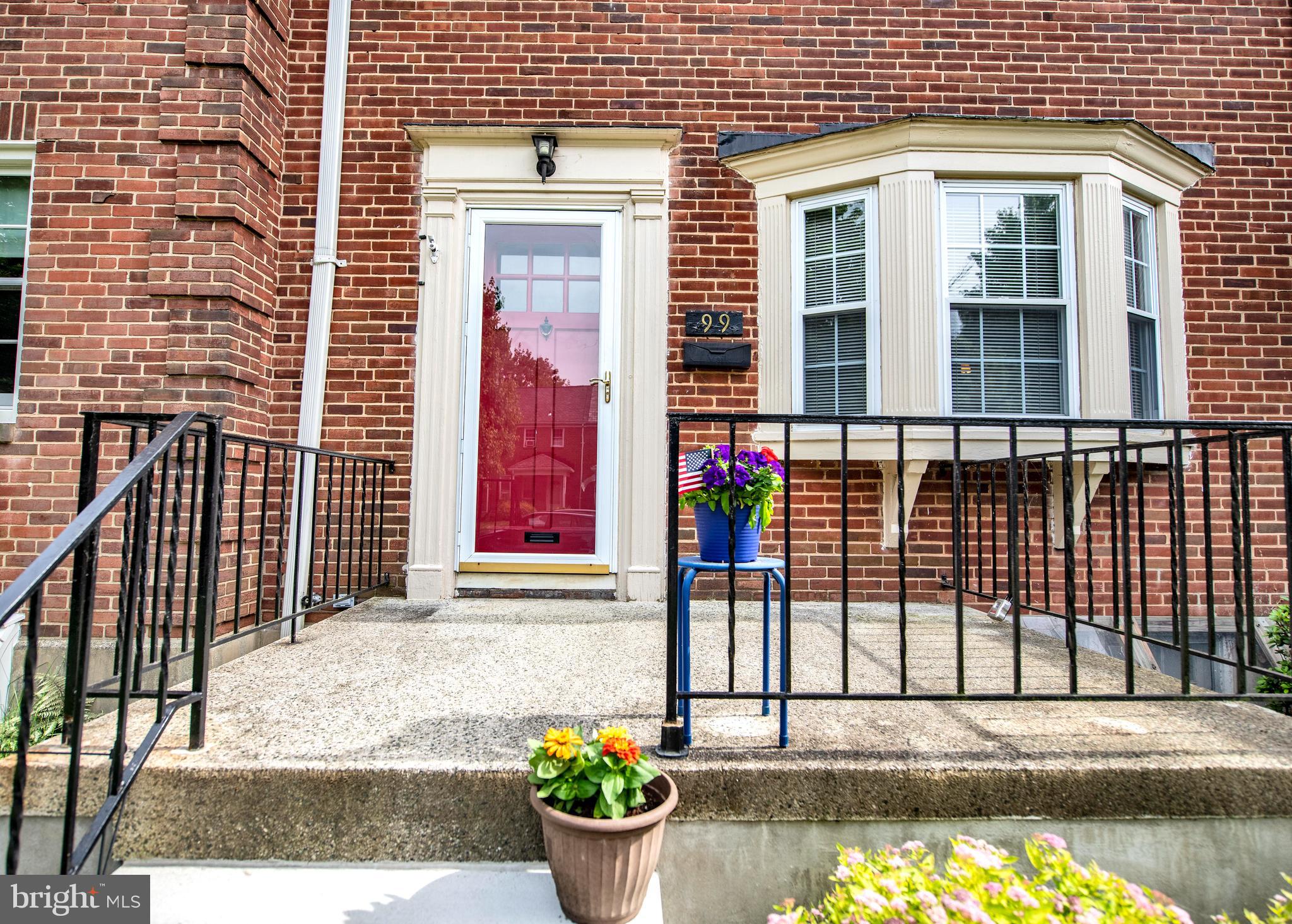 99 Dunkirk Road Baltimore, MD 21212 - Photo 3 of 30 a view of a house with a small yard and wooden fence