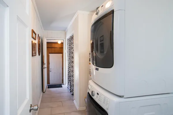 a bathroom with a sink a mirror and a shower