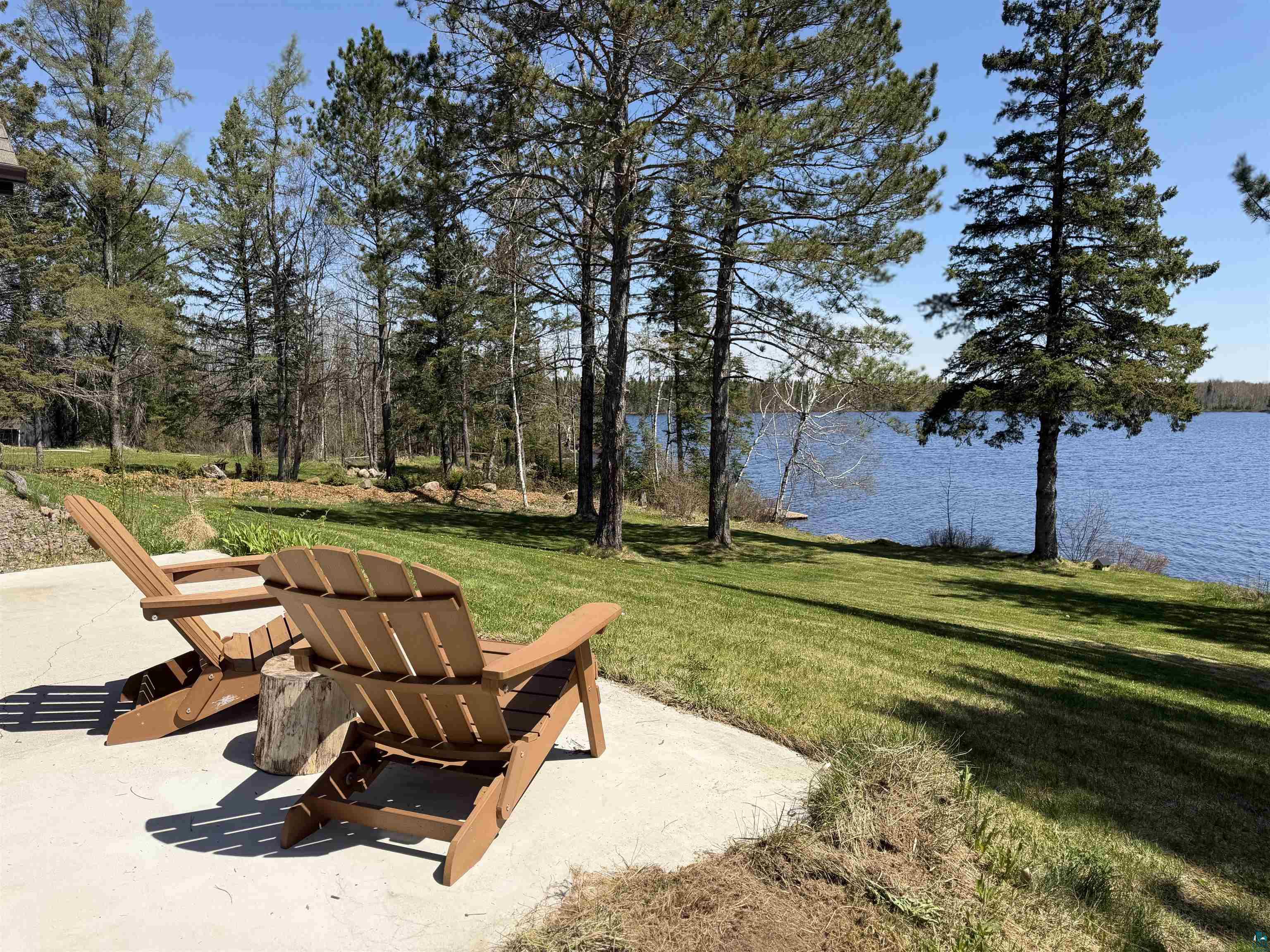 5274 Marble Lake Road Two Harbors, MN 55616 - Photo 58 of 79 Private concrete patio overlooking a serene lake