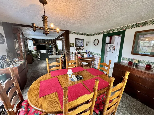 a view of hallway with bathroom and front door