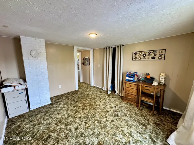 a view of street with parked cars