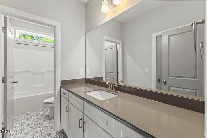 25 West Victoria Rdg Drive, Unit 15 Selma, NC 27576 - Photo 20 of 35 a bathroom with a sink and a mirror