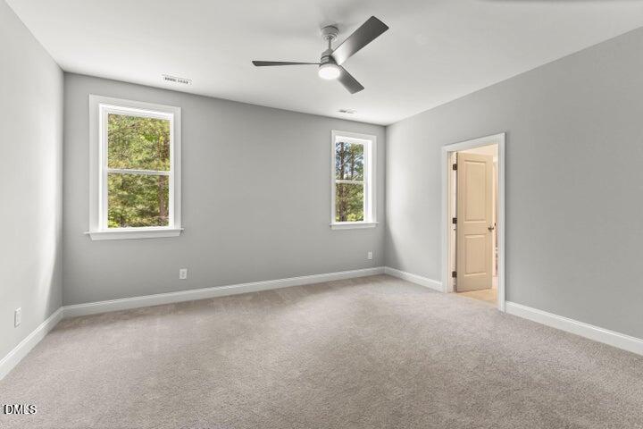 25 West Victoria Rdg Drive, Unit 15 Selma, NC 27576 - Photo 26 of 35 a view of an empty room with a window