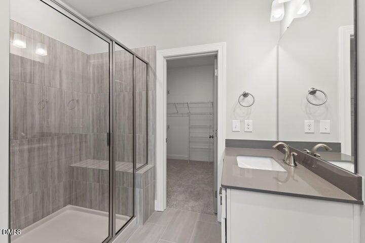 25 West Victoria Rdg Drive, Unit 15 Selma, NC 27576 - Photo 30 of 35 a bathroom with a sink and a mirror