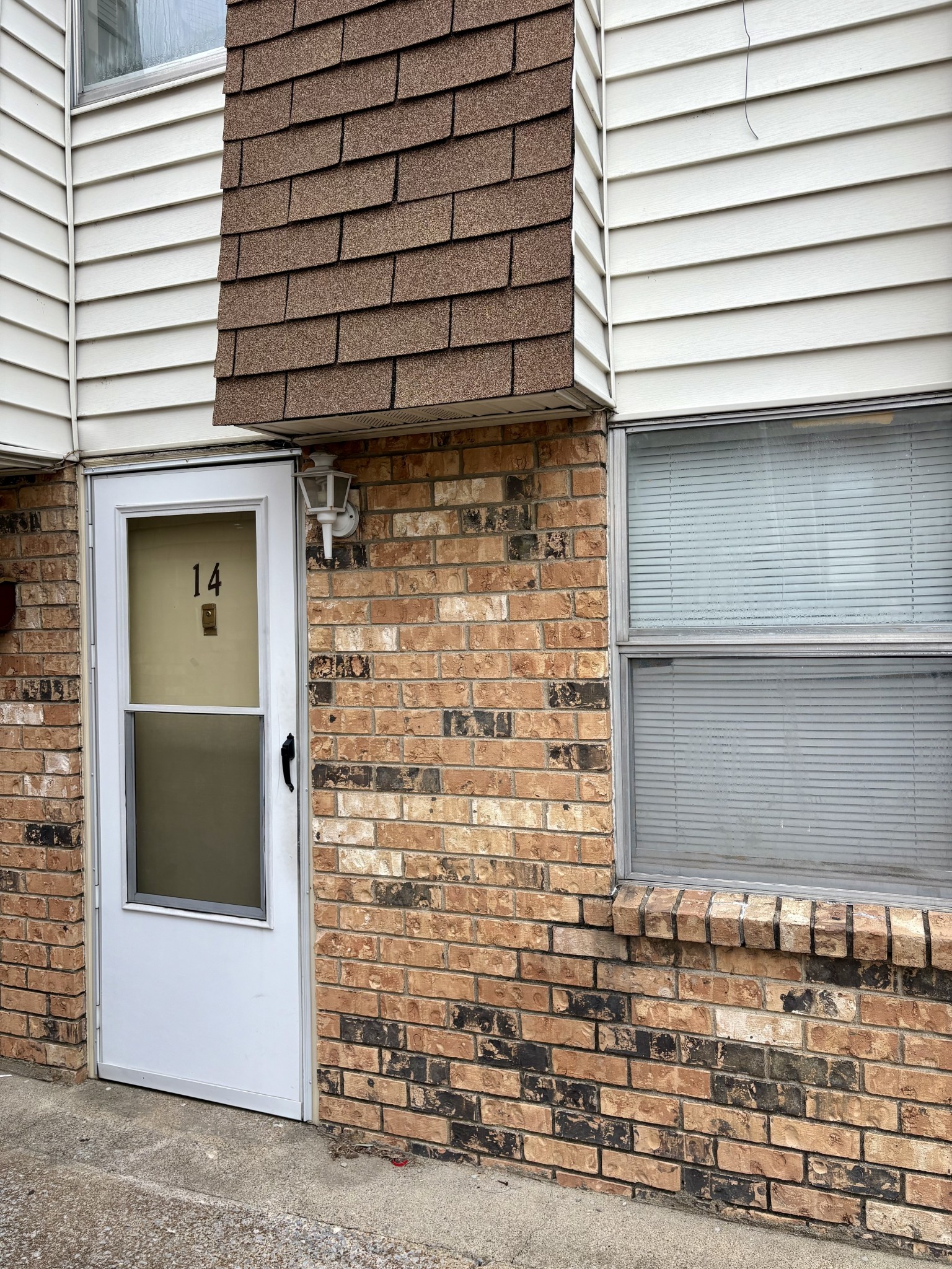 a front view of a house with parking