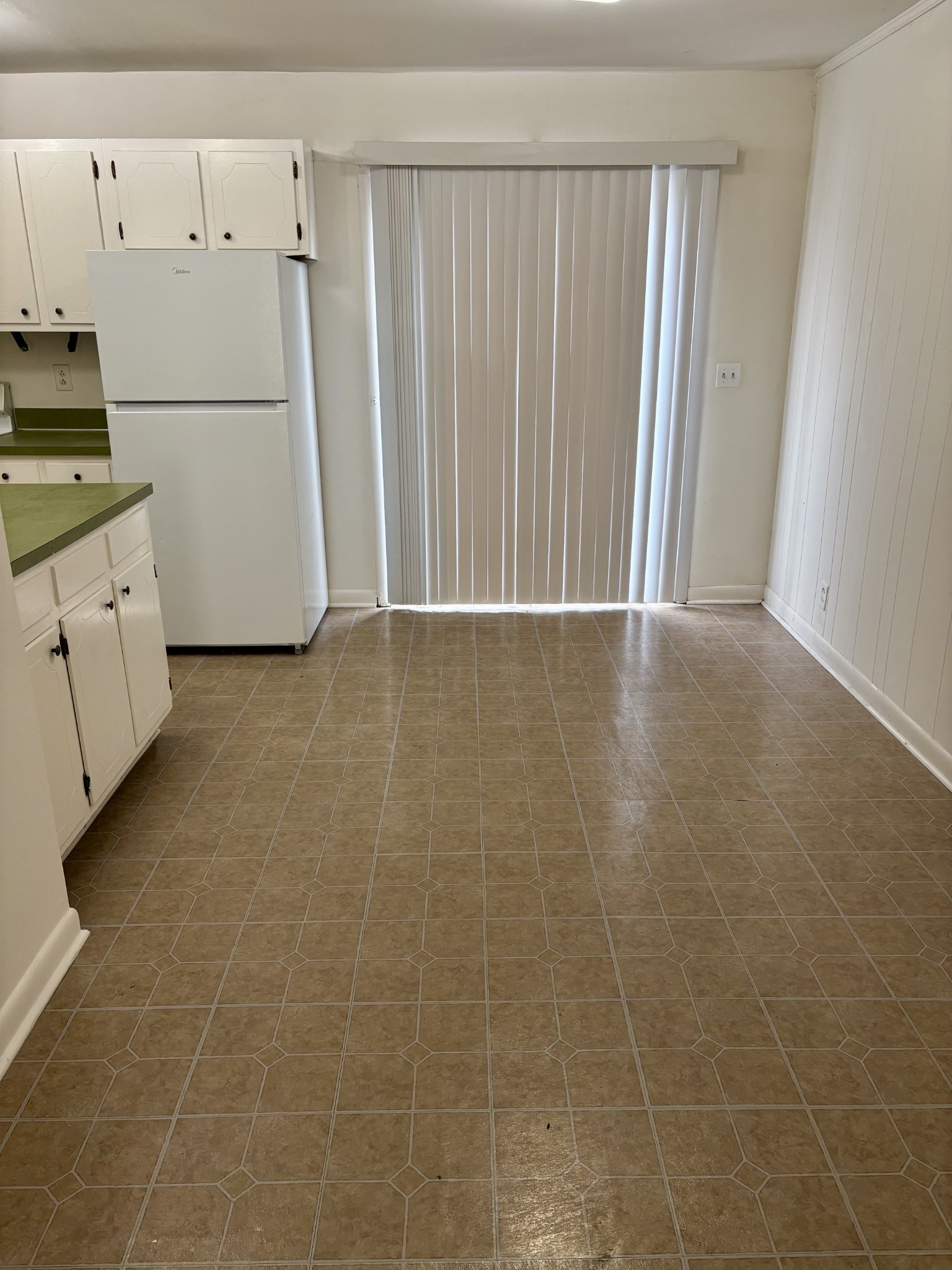 370 Wallace Road, Unit C14 Nashville, TN 37211 - Photo 5 of 8 a view of a kitchen with white cabinets and white appliances