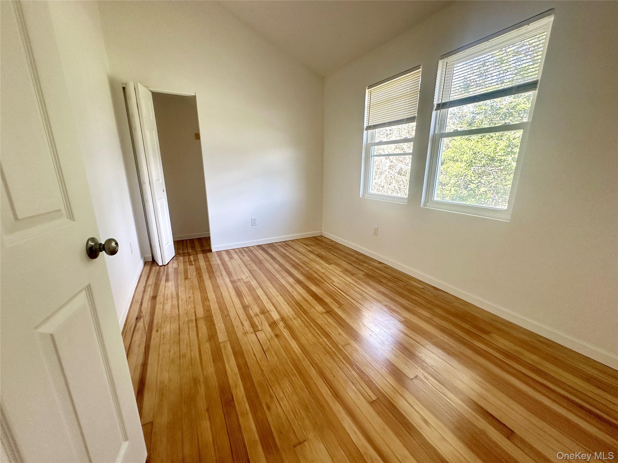 2187 Highway 302, Unit 2 Middletown, NY 10941 - Photo 6 of 13 a view of a room with wooden floor and a window