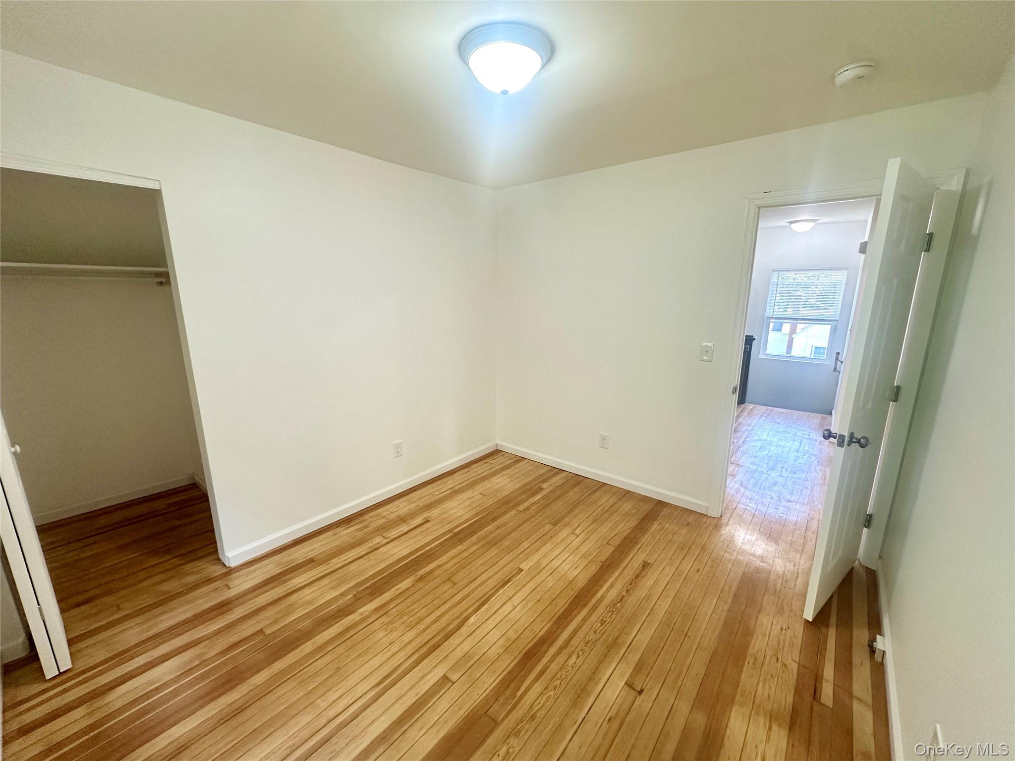 2187 Highway 302, Unit 2 Middletown, NY 10941 - Photo 9 of 13 a view of a room with wooden floor and bathroom