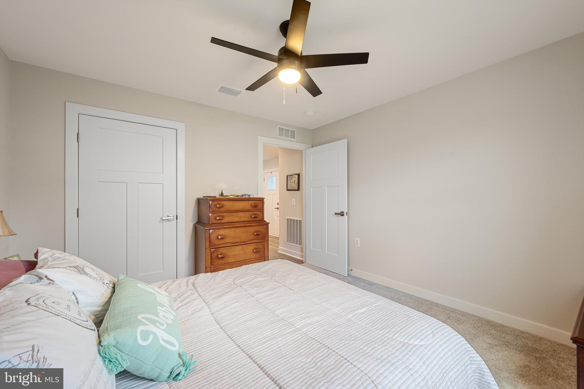 210 Aerator Road Inwood, WV 25428 - Photo 19 of 29 Walk in closet and ceiling fan