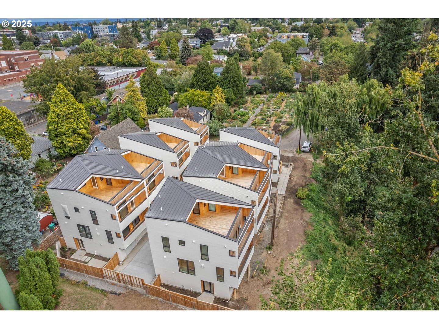 an aerial view of residential house with outdoor space