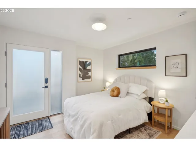 a bedroom with a bed and a cabinets