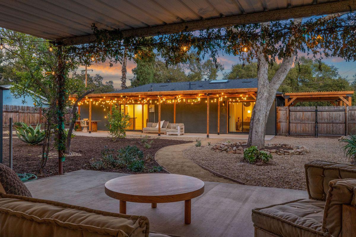 1107 South Rice Road Ojai, CA 93023 - Photo 18 of 24 a view of a porch with furniture and wooden floor