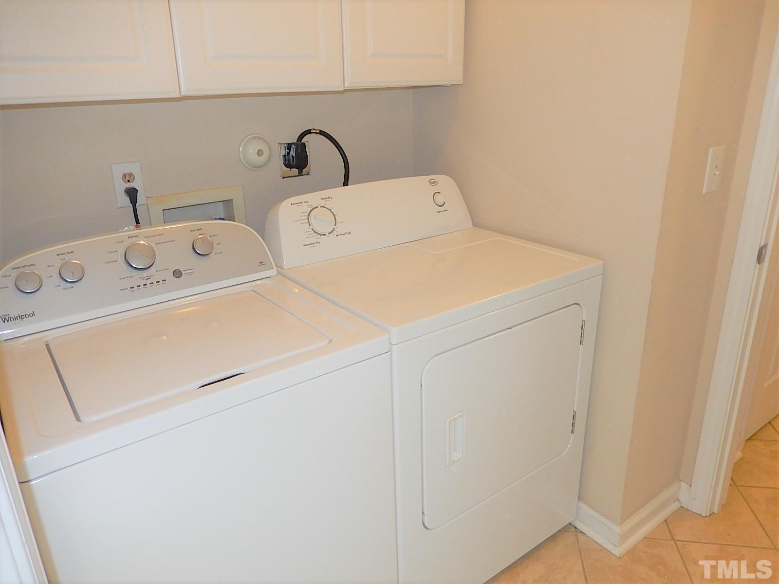 4717 Delta Ridge Court Raleigh, NC 27612 - Photo 17 of 30 a utility room with dryer and washer