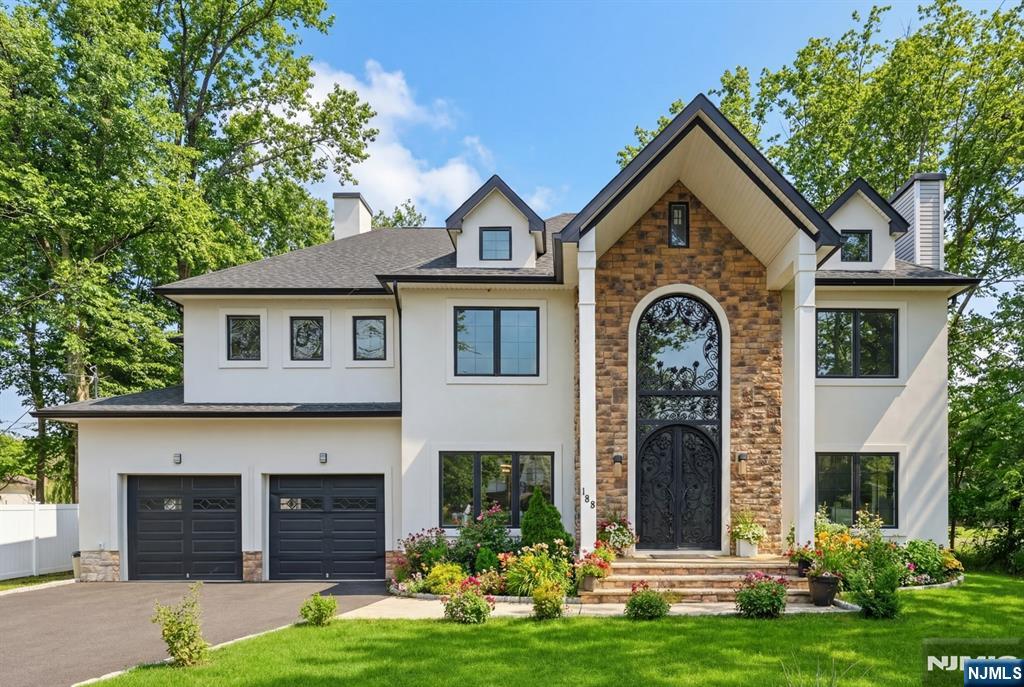 188 Edwards Road Parsippany, NJ 07054 - Photo 1 of 41 a view of a house with yard and garden
