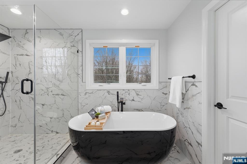 188 Edwards Road Parsippany, NJ 07054 - Photo 25 of 41 a bathroom with a sink and shower