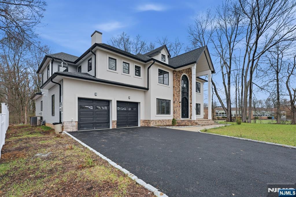 188 Edwards Road Parsippany, NJ 07054 - Photo 34 of 41 a front view of a house with a yard