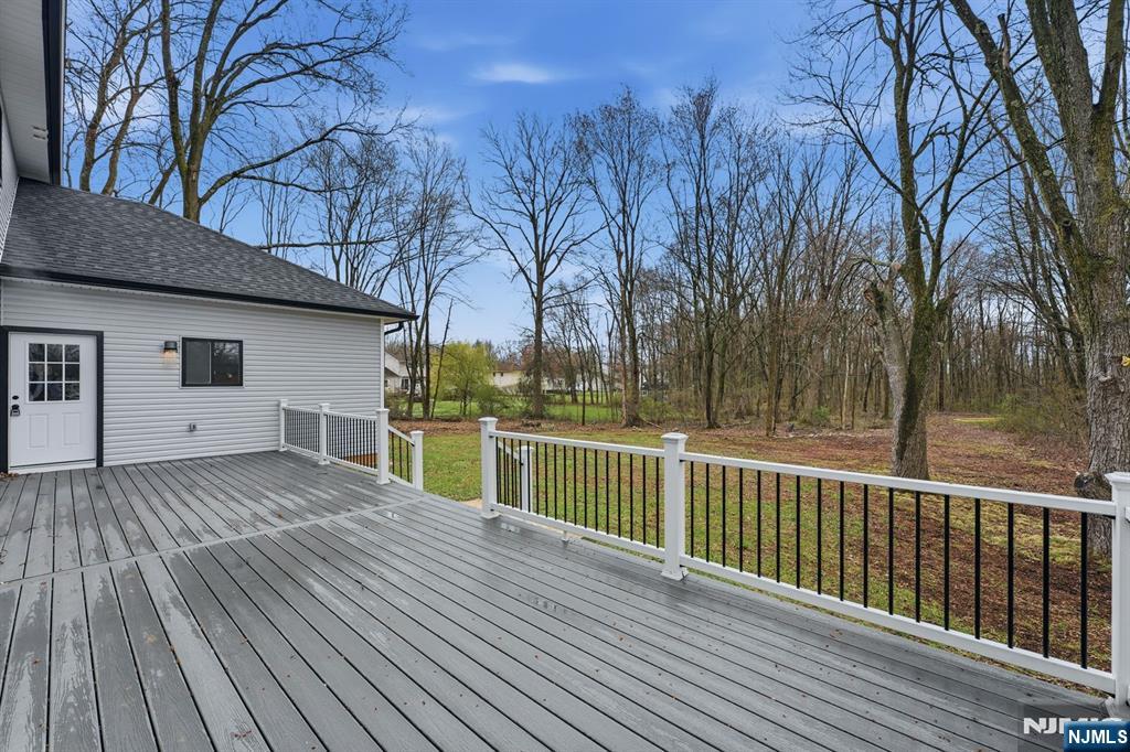 188 Edwards Road Parsippany, NJ 07054 - Photo 37 of 41 a view of a house with a wooden deck