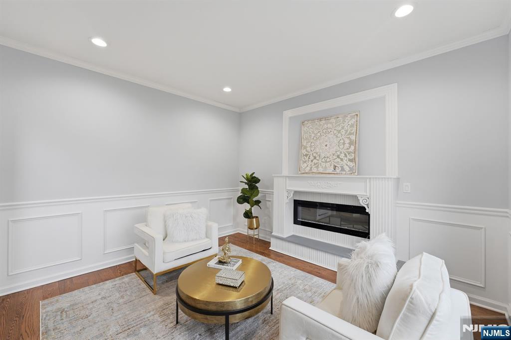 188 Edwards Road Parsippany, NJ 07054 - Photo 8 of 41 a living room with furniture and a fireplace