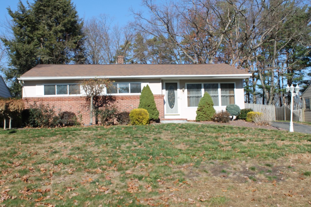 76 Brittany Road Springfield, MA 01151 - Photo 1 of 30 front view of a house with a yard