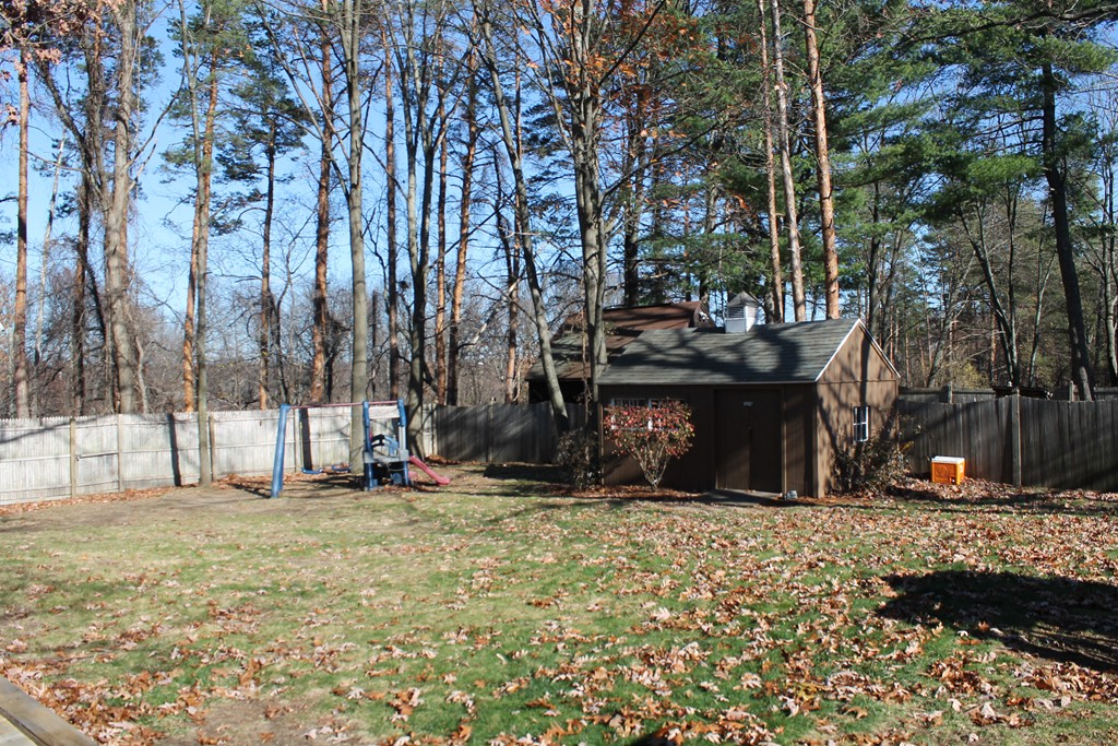 76 Brittany Road Springfield, MA 01151 - Photo 28 of 30 a view of outdoor space with deck and tree
