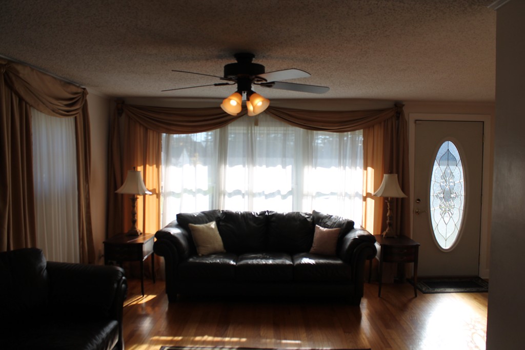 76 Brittany Road Springfield, MA 01151 - Photo 10 of 30 a living room with furniture and a window