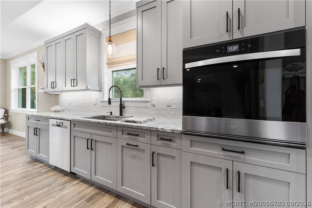 6930 Southwest Rattlesnake Run Palm City, FL 34990 - Photo 12 of 40 Kitchen