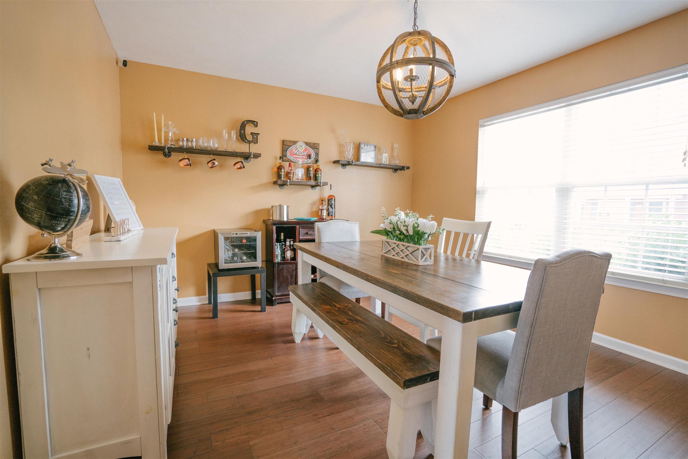 1923 Shaylin Loop Antioch, TN 37013 - Photo 2 of 12 Spacious Dining with Upgraded light fixture and Bamboo flooring
