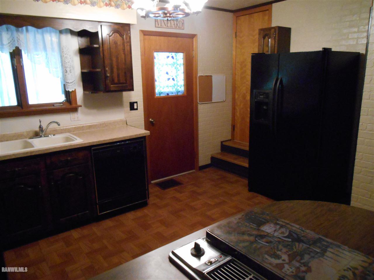 12960 Old Route Forreston, IL 61030 - Photo 6 of 21 a bedroom with a bed and a mirror