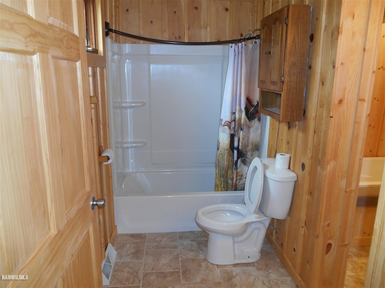 12960 Old Route Forreston, IL 61030 - Photo 8 of 21 a bathroom with a shower and a toilet