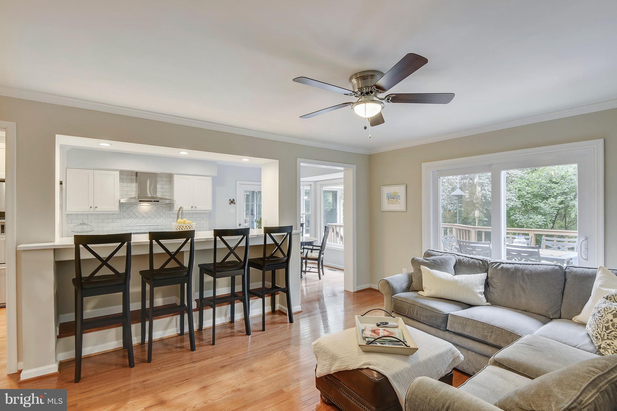301 Canterfield Road Annapolis, MD 21403 - Photo 13 of 29 Bar seating opens kitchen to family room