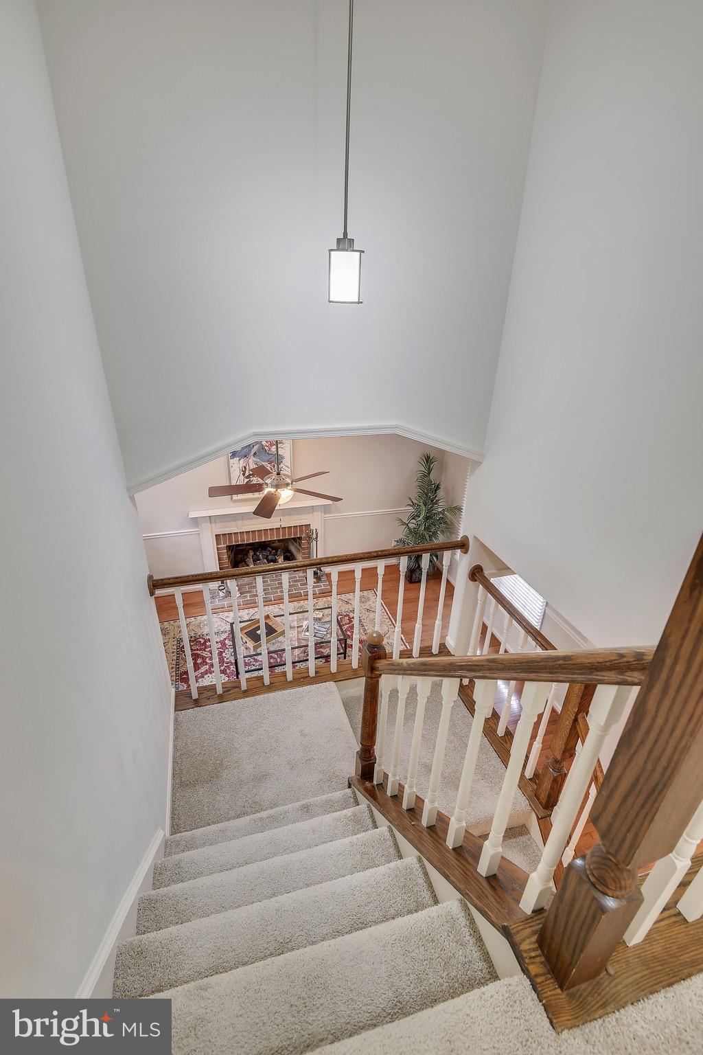 301 Canterfield Road Annapolis, MD 21403 - Photo 16 of 29 Stairwell leads to loft view of living room