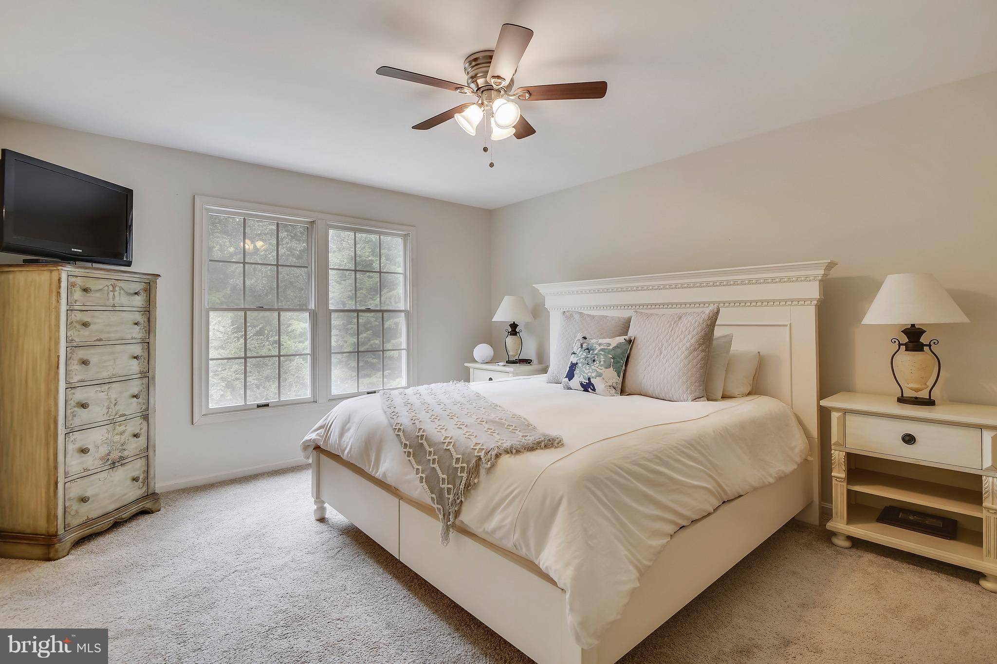 301 Canterfield Road Annapolis, MD 21403 - Photo 18 of 29 Plenty of light in master, windows look into woods