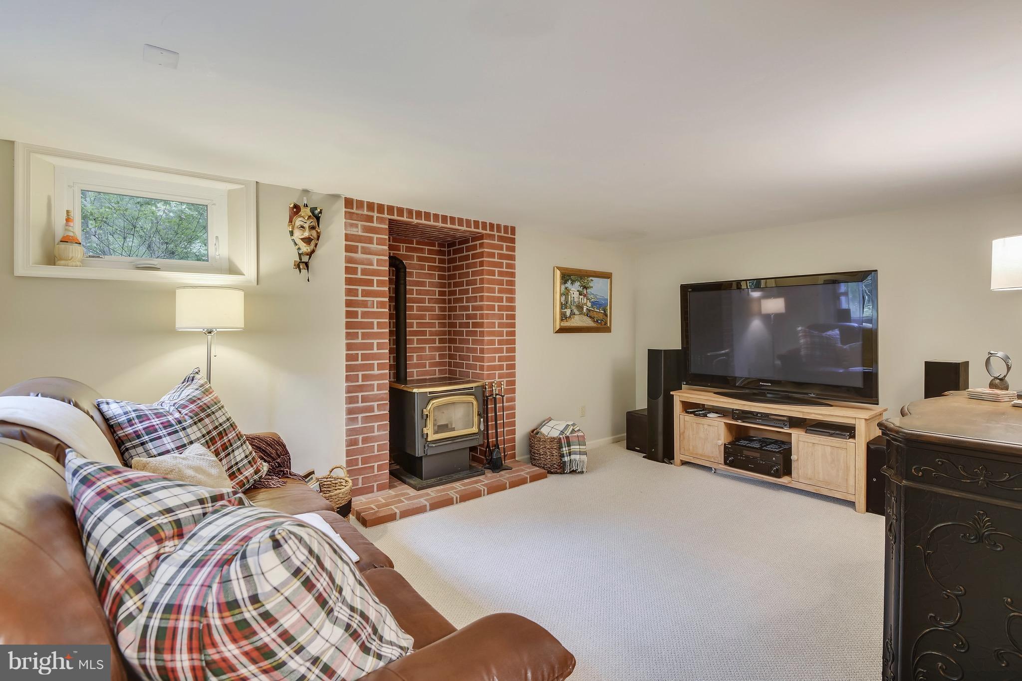 301 Canterfield Road Annapolis, MD 21403 - Photo 24 of 29 Recreation/Media room with wood pellet stove