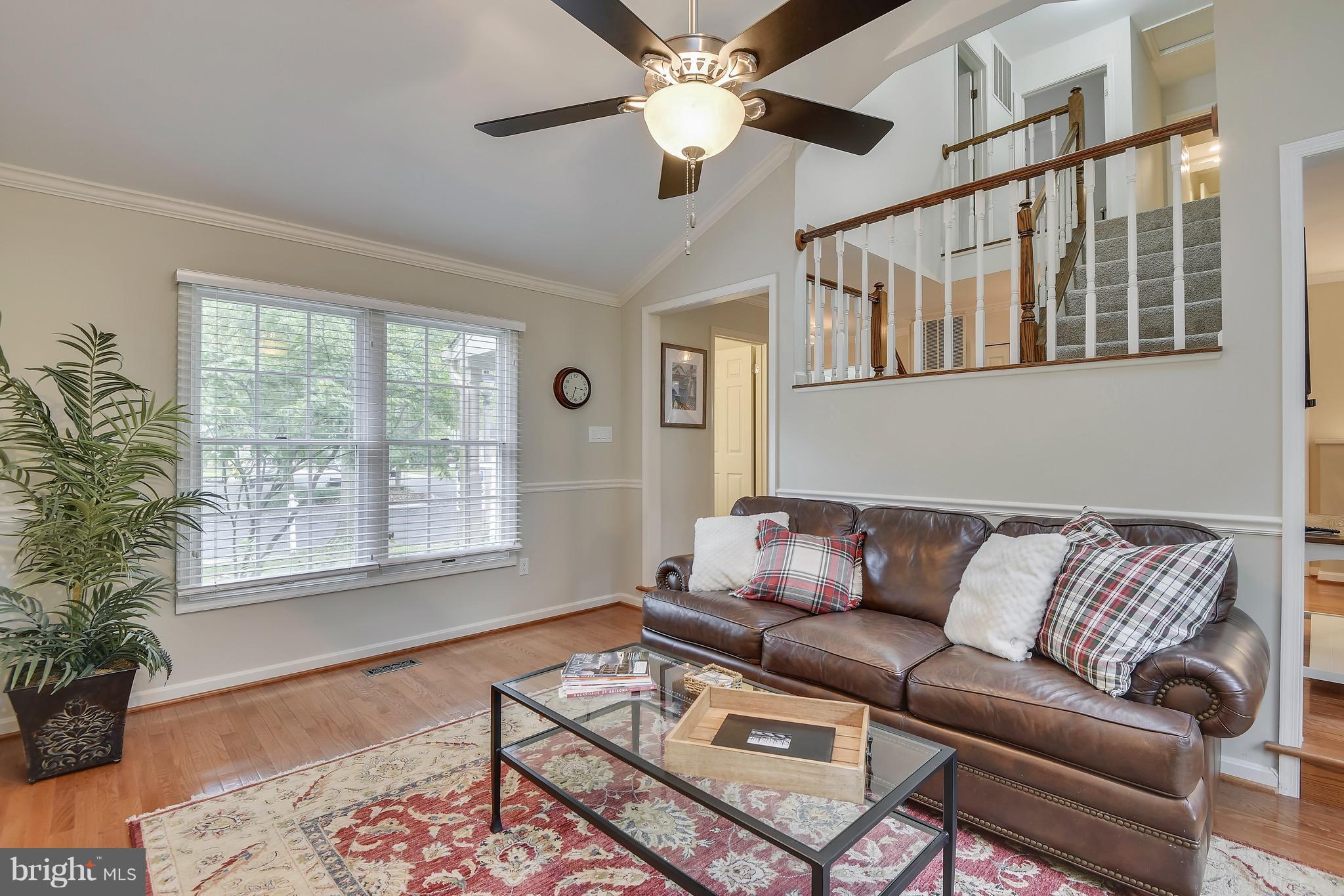 301 Canterfield Road Annapolis, MD 21403 - Photo 7 of 29 Open stairway leads to more light and space