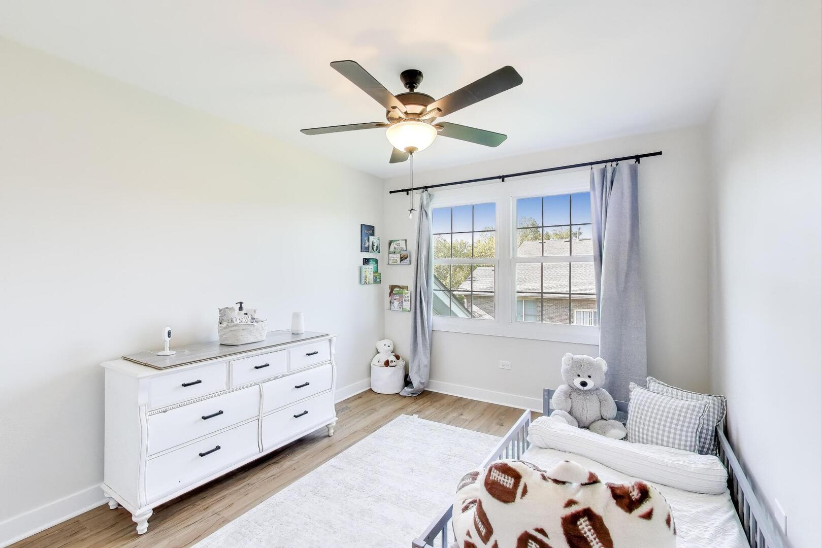 10521 Thornham Lane, Unit 10521 Mokena, IL 60448 - Photo 16 of 21 a bedroom with a bed and a window