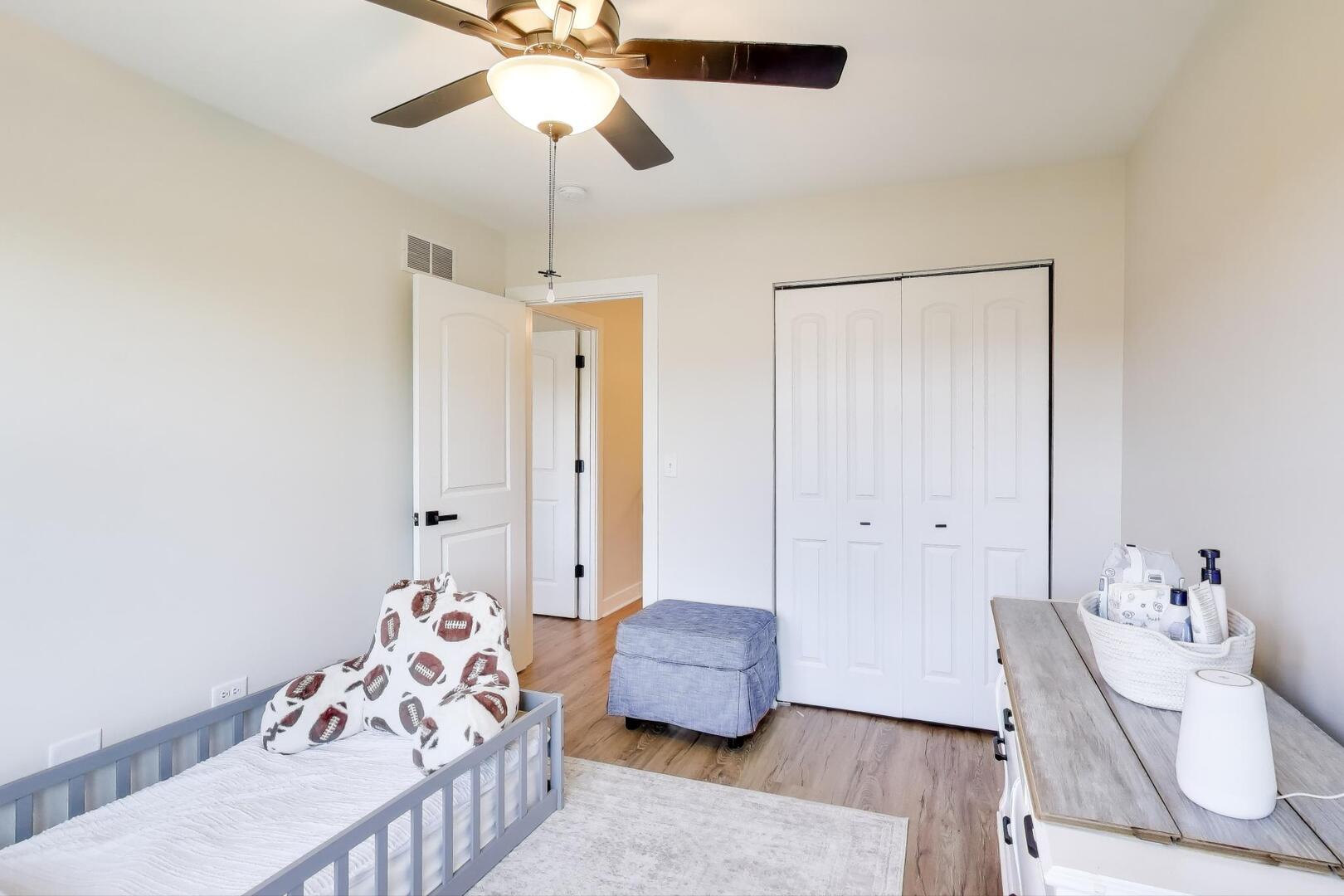 10521 Thornham Lane, Unit 10521 Mokena, IL 60448 - Photo 17 of 21 a bedroom with furniture and a ceiling fan