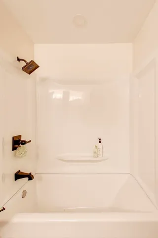 a bathroom with a bathtub