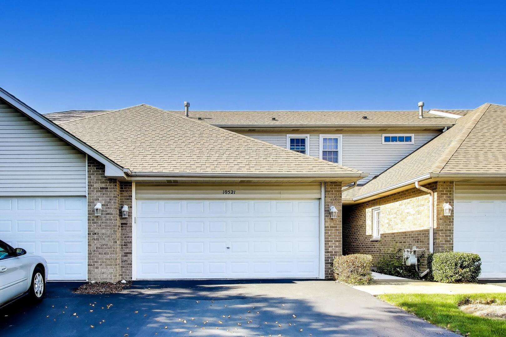 10521 Thornham Lane, Unit 10521 Mokena, IL 60448 - Photo 2 of 21 a view of a house with a patio