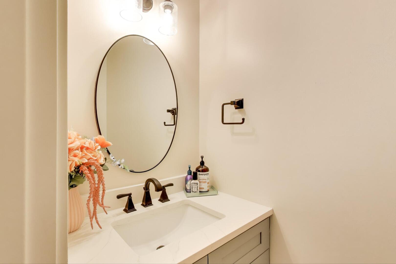 10521 Thornham Lane, Unit 10521 Mokena, IL 60448 - Photo 10 of 21 a bathroom with a sink and a mirror