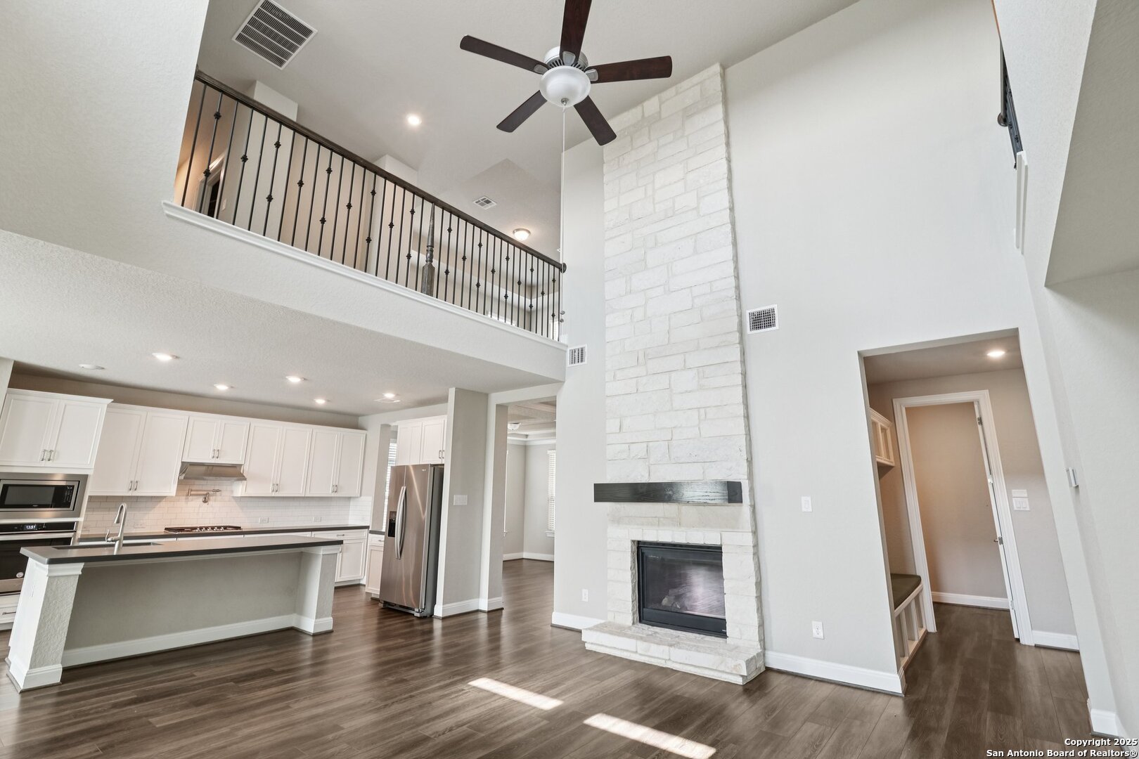 2622 Raven Ridge Point San Antonio, TX 78259 - Photo 14 of 53 a view of kitchen with sink microwave and stove