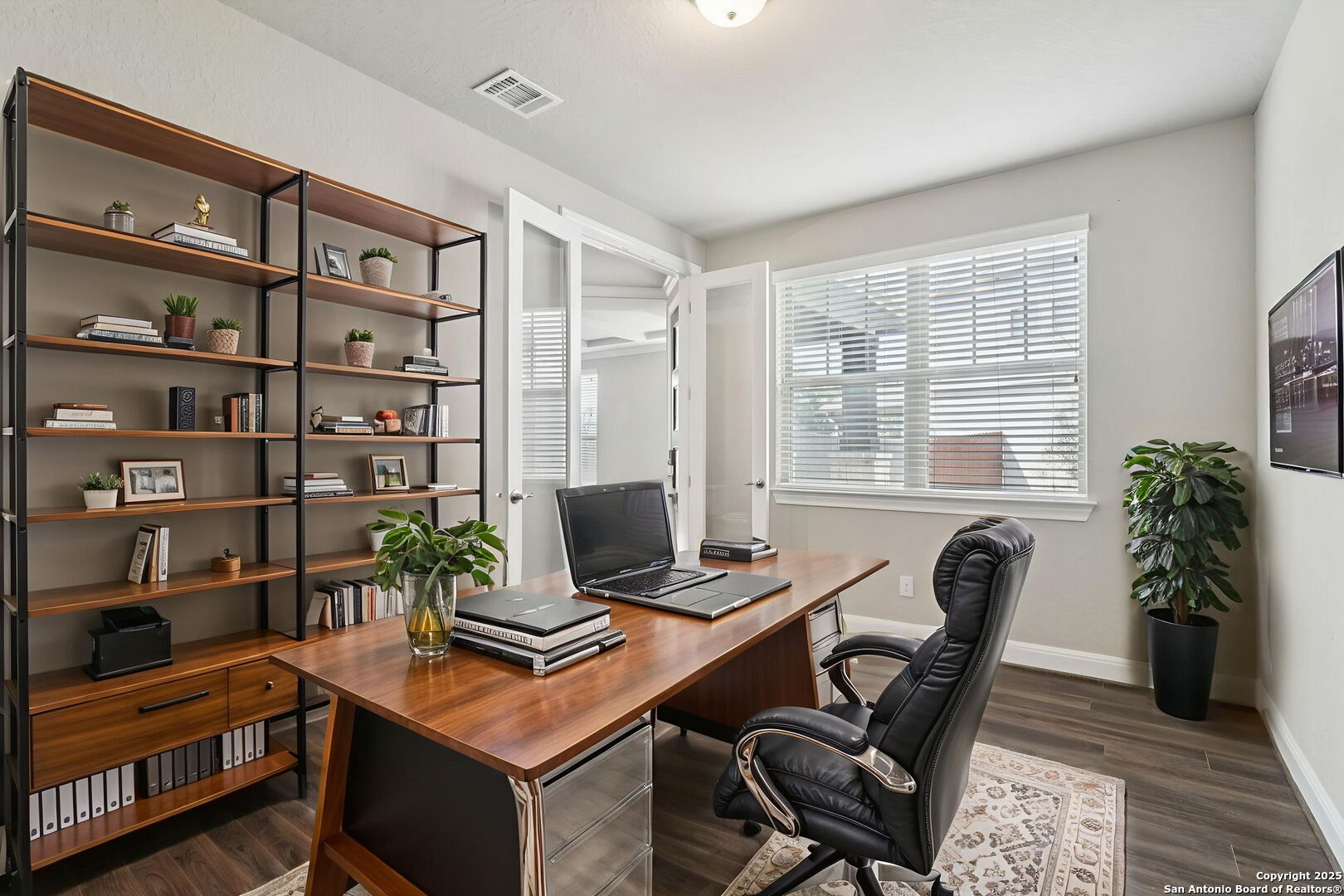 2622 Raven Ridge Point San Antonio, TX 78259 - Photo 20 of 53 a view of a workspace with furniture and a window