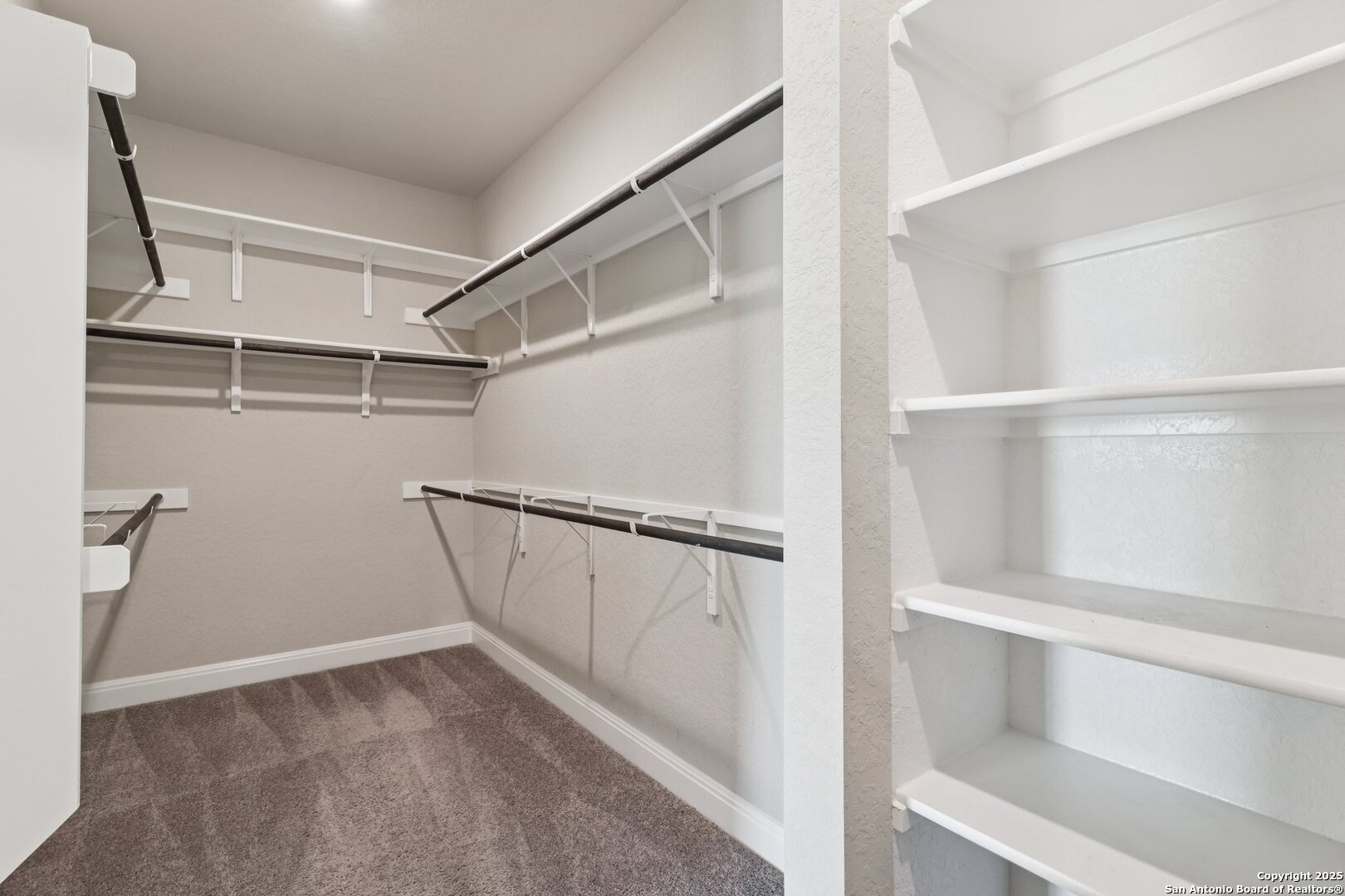 2622 Raven Ridge Point San Antonio, TX 78259 - Photo 26 of 53 a view of an empty walk in closet