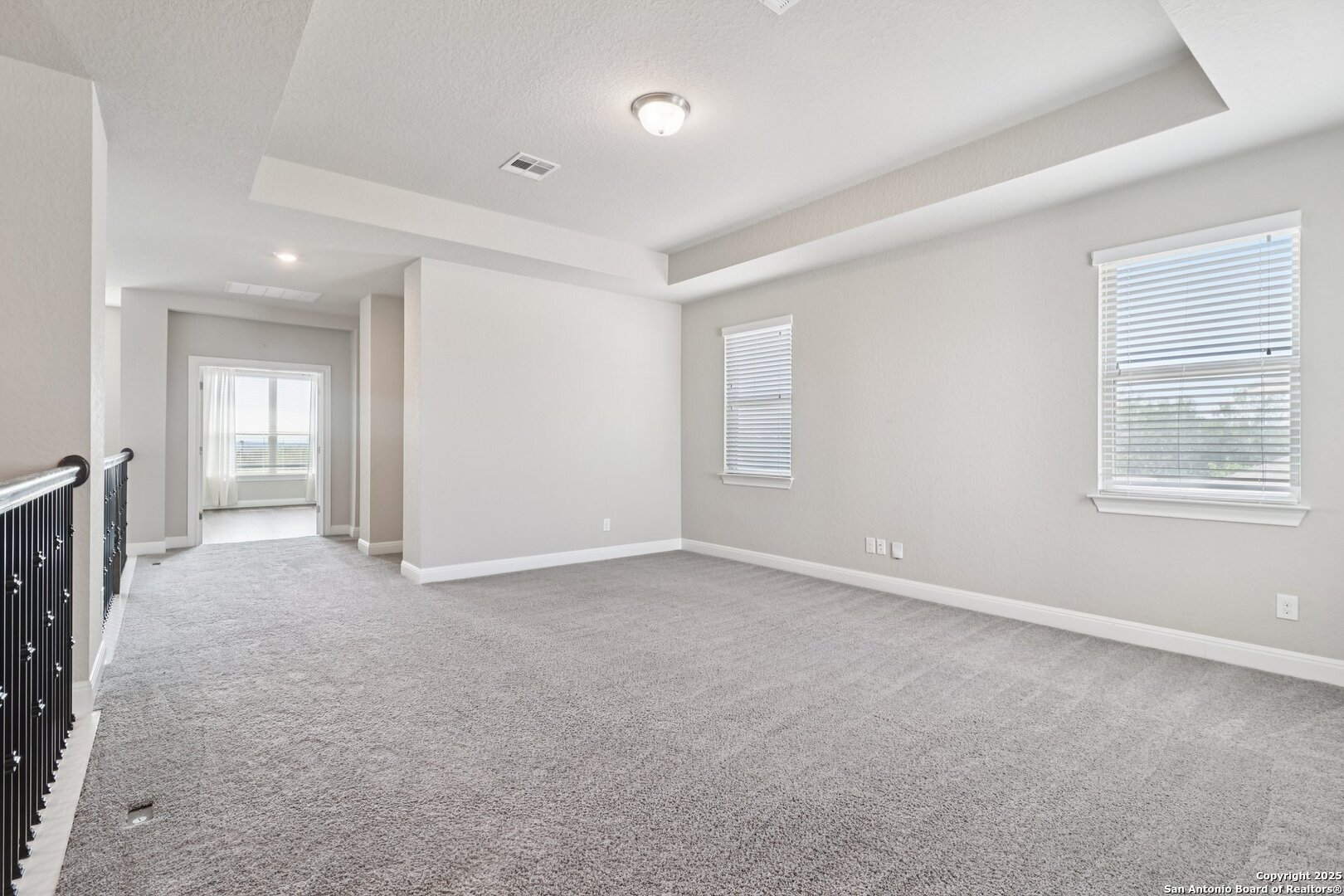 2622 Raven Ridge Point San Antonio, TX 78259 - Photo 28 of 53 an empty room with windows and closet