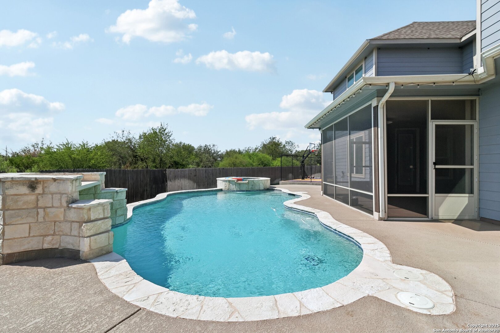 2622 Raven Ridge Point San Antonio, TX 78259 - Photo 3 of 53 a view of a backyard with swimming pool